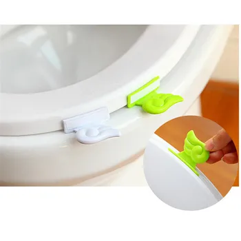 1pc повдигащо устройство гладък държач чист сладък крило трайни хигиенни ръчни консумативи за седалки тоалетна капак повдигач мида 2 цвята